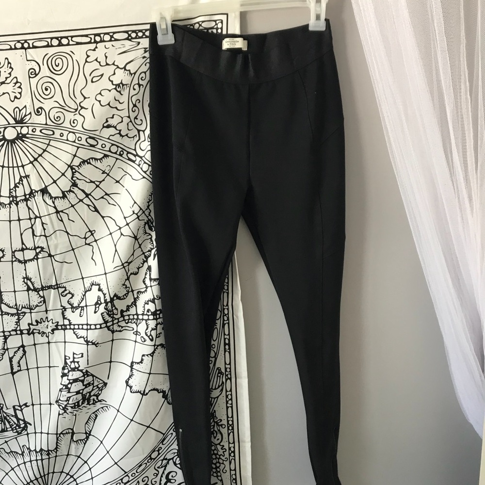 High waisted black leggings with ankle zippers
